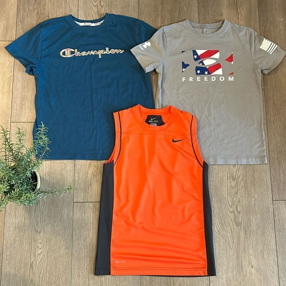 ((3 PIECE)) BOYS ATHLETIC TEE BUNDLE SIZE MEDIUM NIKE UNDER ARMOUR AND CHAMPION